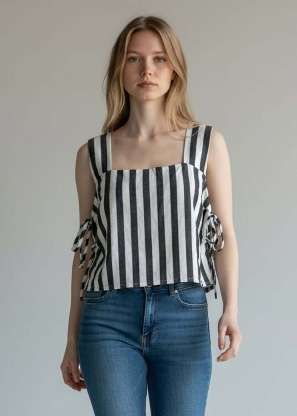 MIOU Muse linen-blend Tank top in a black and white stripe pattern